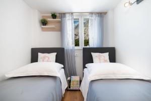 Ein Bett oder Betten in einem Zimmer der Unterkunft Villa Biston