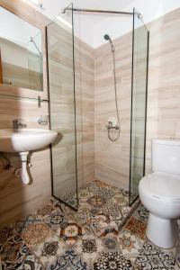 Koupelna v ubytování Poseidon Apartments