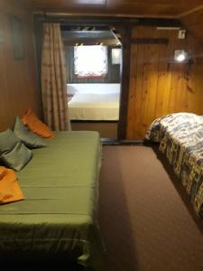 Una cama o camas en una habitación de Guest House Leona