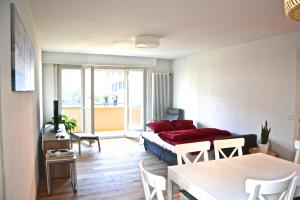 Posezení v ubytování Plage & Montagne - Appartement familial à proximité de la plage de Préverenges