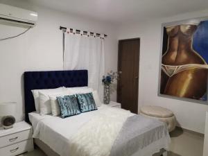 Ein Bett oder Betten in einem Zimmer der Unterkunft Hotel Platinum Barranquilla