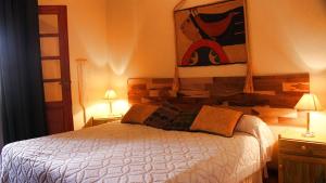 Cama ou camas em um quarto em Posada San Andres