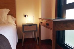 Łóżko lub łóżka w pokoju w obiekcie Apartamento completo con parking privado y WiFi en San Roque