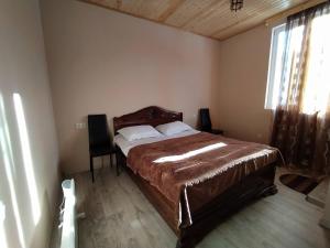 Postel nebo postele na pokoji v ubytování Tetne Qor Guesthouse