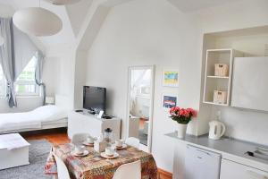 TV a/nebo společenská místnost v ubytování Apartament Central Sopot + 5 fotografií