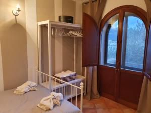 Postel nebo postele na pokoji v ubytování Spazioso appartamento con terrazza a due passi dal centro