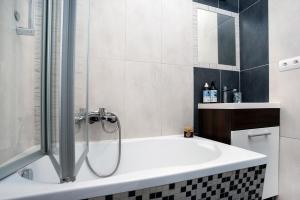 Kúpeľňa v ubytovaní Apartment Elektoralna + 30 fotografií