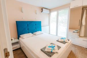 מיטה או מיטות בחדר ב-Turist Apartment