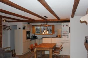 Kuchyň nebo kuchyňský kout v ubytování Appartement Rinderblick