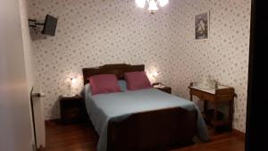 Postel nebo postele na pokoji v ubytování Chambres d'Hôtes et Table d'Hôtes- Valentine 44