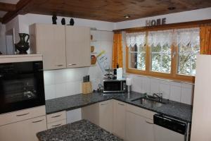 Kuchyň nebo kuchyňský kout v ubytování Appartement Rinderblick + 23 fotografií