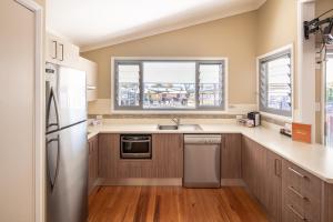 Kjøkken eller kjøkkenkrok på Ingenia Holidays Hunter Valley