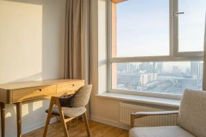Posezení v ubytování Modern apt with views 3 minutes from Sukhbaatar Sq