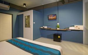 Postel nebo postele na pokoji v ubytování Amity Poshtel