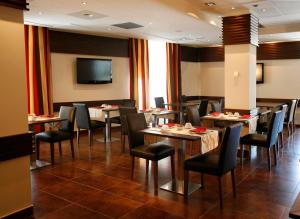 En restaurant eller et andet spisested på Hotel Villa de Aranda