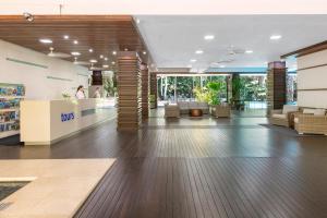 Vstupní hala nebo recepce v ubytování Drift Palm Cove + 37 fotografií