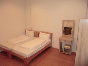 Postel nebo postele na pokoji v ubytování Sakura House