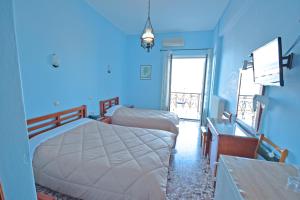Postel nebo postele na pokoji v ubytování Hotel Blue Sea