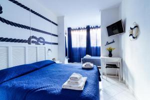 Posteľ alebo postele v izbe v ubytovaní "6 in centro" guest house