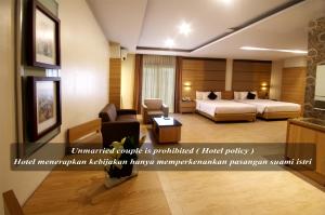 Postel nebo postele na pokoji v ubytování Hotel Gren Alia Cikini