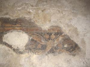 a painting on the floor of a cave at Elci Konagi Butik Hotel in Urfa