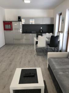 Kuchyň nebo kuchyňský kout v ubytování Apartmány SOFIA Kamenice nad Lipou