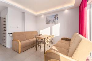 Posedenie v ubytovaní Apartamenty Flamingo by Noclegi Renters