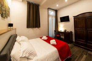 A bed or beds in a room at Medici Soderini