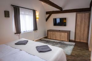 Voodi või voodid majutusasutuse Vila Albrecht Vimperk toas