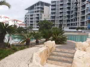 Swimming pool sa o malapit sa Ocean Village apartment