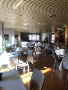 Restoran või mõni muu söögikoht majutusasutuses Albergo Casa dell'Ospite