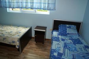 Кровать или кровати в номере Holiday home in Tkhilnari #1, #2, #3, #4