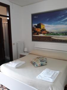 Postel nebo postele na pokoji v ubytování Hotel Rosy