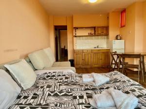 Postel nebo postele na pokoji v ubytování Family Hotel Carpe Diem