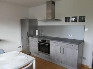 Kuchyň nebo kuchyňský kout v ubytování Ferienwohnung Jürgen Brill