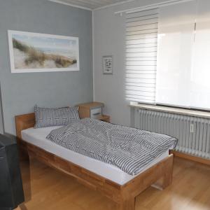 Postel nebo postele na pokoji v ubytování Ferienwohnung Jürgen Brill