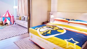 Postel nebo postele na pokoji v ubytování Shangri-La Songbei, Harbin