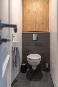 a bathroom with a toilet and a sink at Gorgeous And Stylish Place For Two In Hip West! in Amsterdam