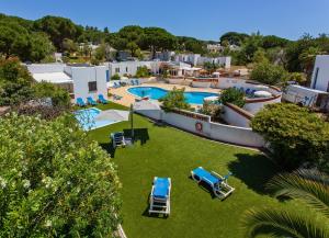 an aerial view of a resort with a swimming pool at Prado do Golf in Vilamoura