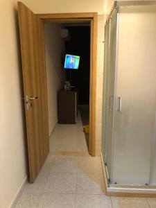 A television and/or entertainment centre at B&B Relais Aeclanum
