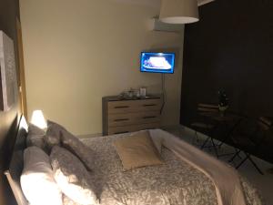 A bed or beds in a room at B&B Relais Aeclanum