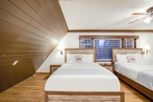 Arrowhead Tree Top Lodge客房内的一张或多张床位