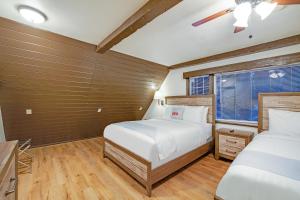 Arrowhead Tree Top Lodge客房内的一张或多张床位