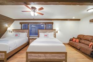 Arrowhead Tree Top Lodge客房内的一张或多张床位