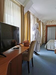 TV a/nebo společenská místnost v ubytování Hotel Cristal