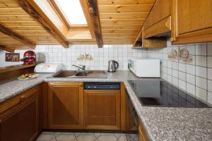 Kuchyň nebo kuchyňský kout v ubytování Touring Galerie