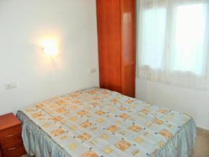 A bed or beds in a room at Rocamaura I B 6-1 Még 7 kép