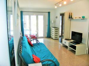 A television and/or entertainment centre at Rocamaura I B 6-1