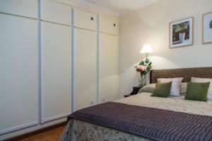 Ein Bett oder Betten in einem Zimmer der Unterkunft Blue House Rosalias