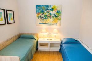 Ein Sitzbereich in der Unterkunft Blue House Rosalias